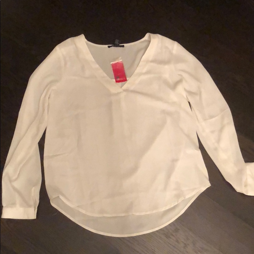 white long sleeve top